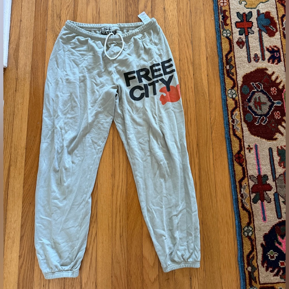 Freecity Light Gray Sweatpants with Black Text